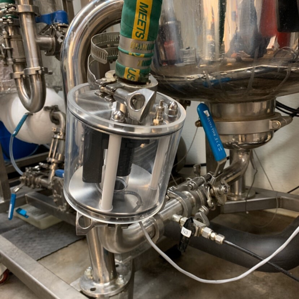 Fraction Finder on a sight glass on an ethanol extractor